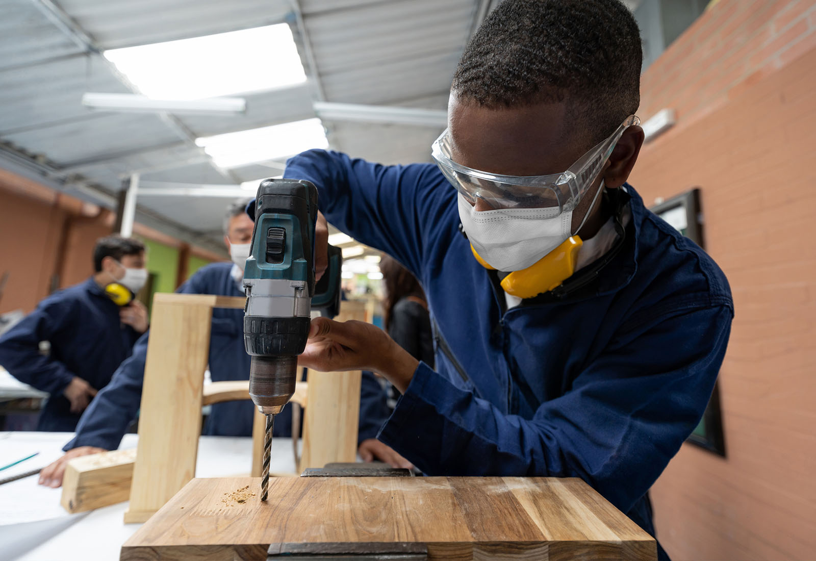 Student in woodshop class